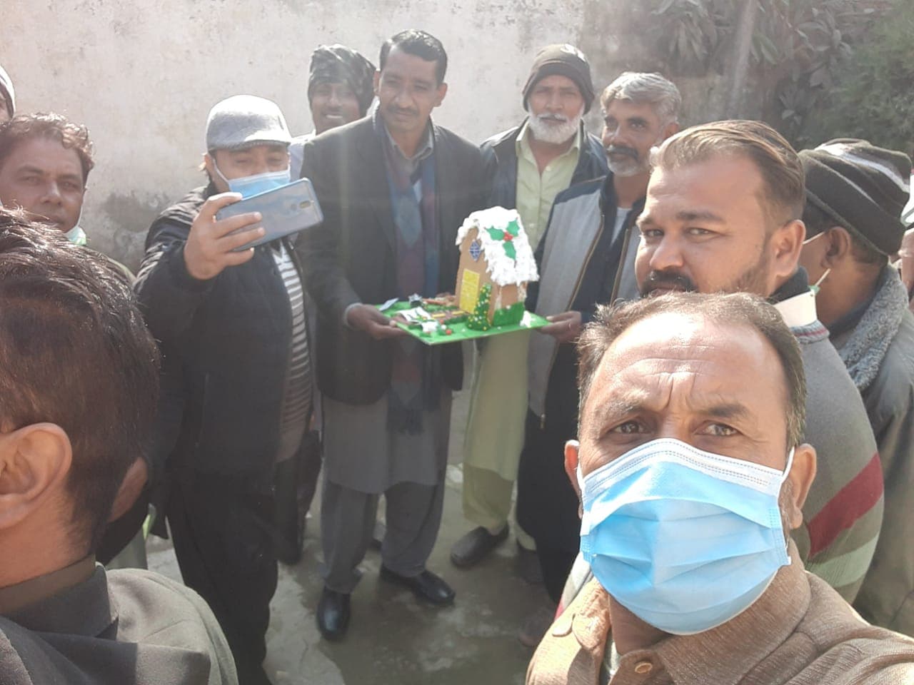 Xmas cake cutting ceremony held at CFI dispensary Rawalpindi By Dr,Azhar Ali